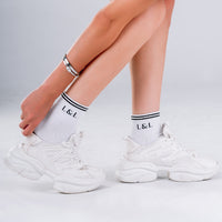 Sneaker Retro Damen Schwarz-Weiß – Retro & Vielseitig